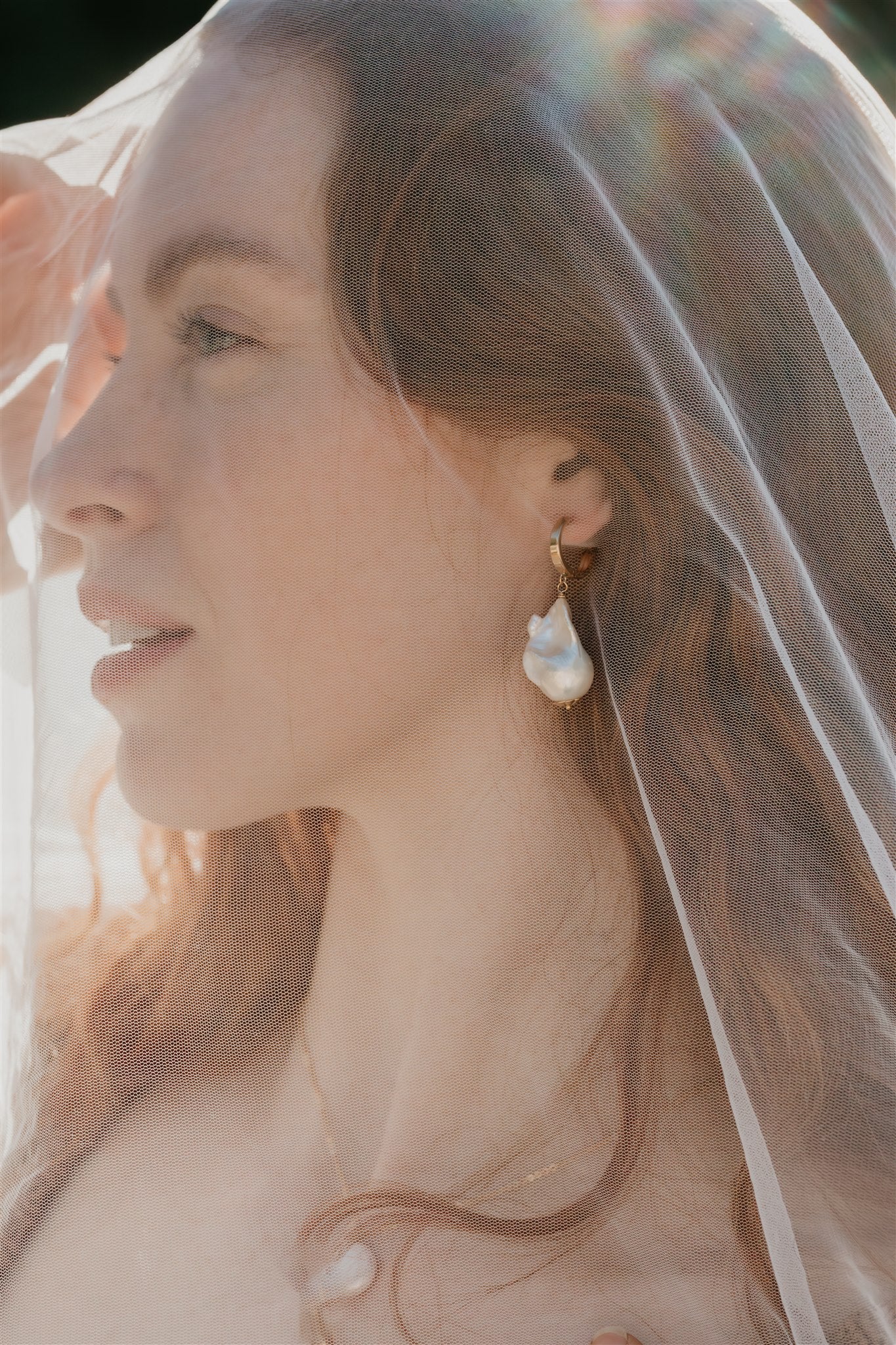 Woman wearing a veil with a soft, blurred background